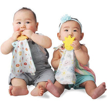 sweet and salty Munch-It Blanket- a convenient teether and cozy blanket for baby. Designed to target baby's emerging front& eye teeth as well as early molars.  The soft blanket is perfect for snuggling and absorbing drool